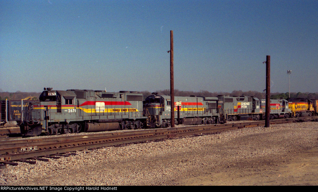 CSX 2671 sits with other locos in the yard